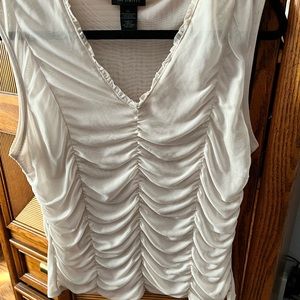 Beautiful sleeveless cream classic shirt